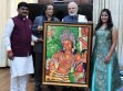 Late Mr M.R Pimpare offering a digital painting from Ajanta Temple to Shri Prime Minister Narendra Modi