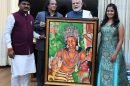 Late Mr M.R Pimpare offering a digital painting from Ajanta Temple to Shri Prime Minister Narendra Modi